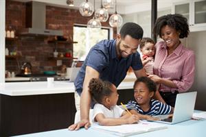Parents helping their kids to learn 